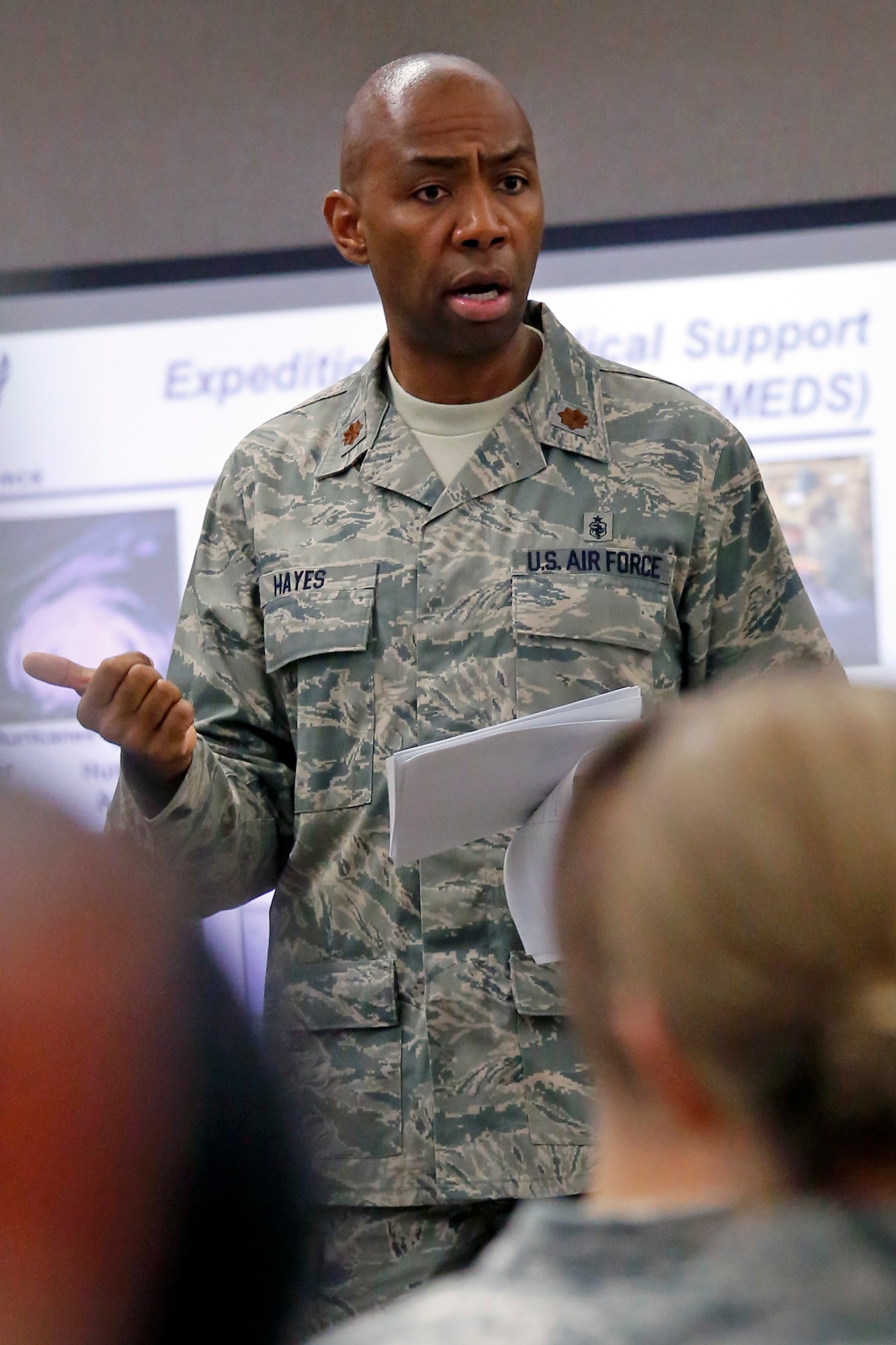 Maj. Cleveland Hayes, a Medical Readiness officer with the 446th Aerospace Medicine Squadron, out of Joint Base Lewis-McChord, Wash., has been a Medical Service Corps officer since 2000, after enlisting into the active-duty Air Force in 1992. He said his squadron is responsible for performing about 200 patient physicals during Reserve  weekends, which he helps facilitate to ensure unit operations run smoothly. (U.S. Air Force Reserve photo by Master Sgt. Jake Chappelle)