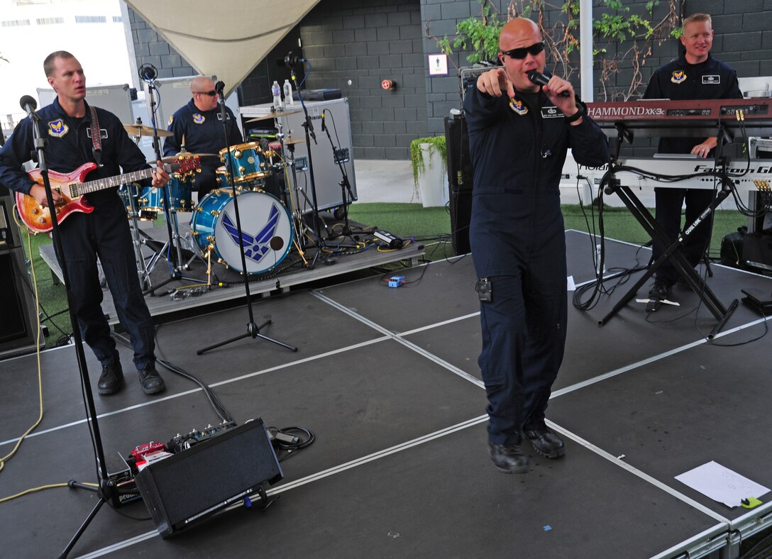 Max Impact, the premier rock band of the United Sates Air Force band, performs for fans before the Washington Nationals versus Miami Marlins baseball game at Nationals Park, Washington, D.C., Sept. 19, 2013. Airmen from the National Capitol Region participated in various pre-game events and ceremonies in honor of Air Force Night. (U.S. Air Force photo/Airman 1st Class Erin O’Shea)