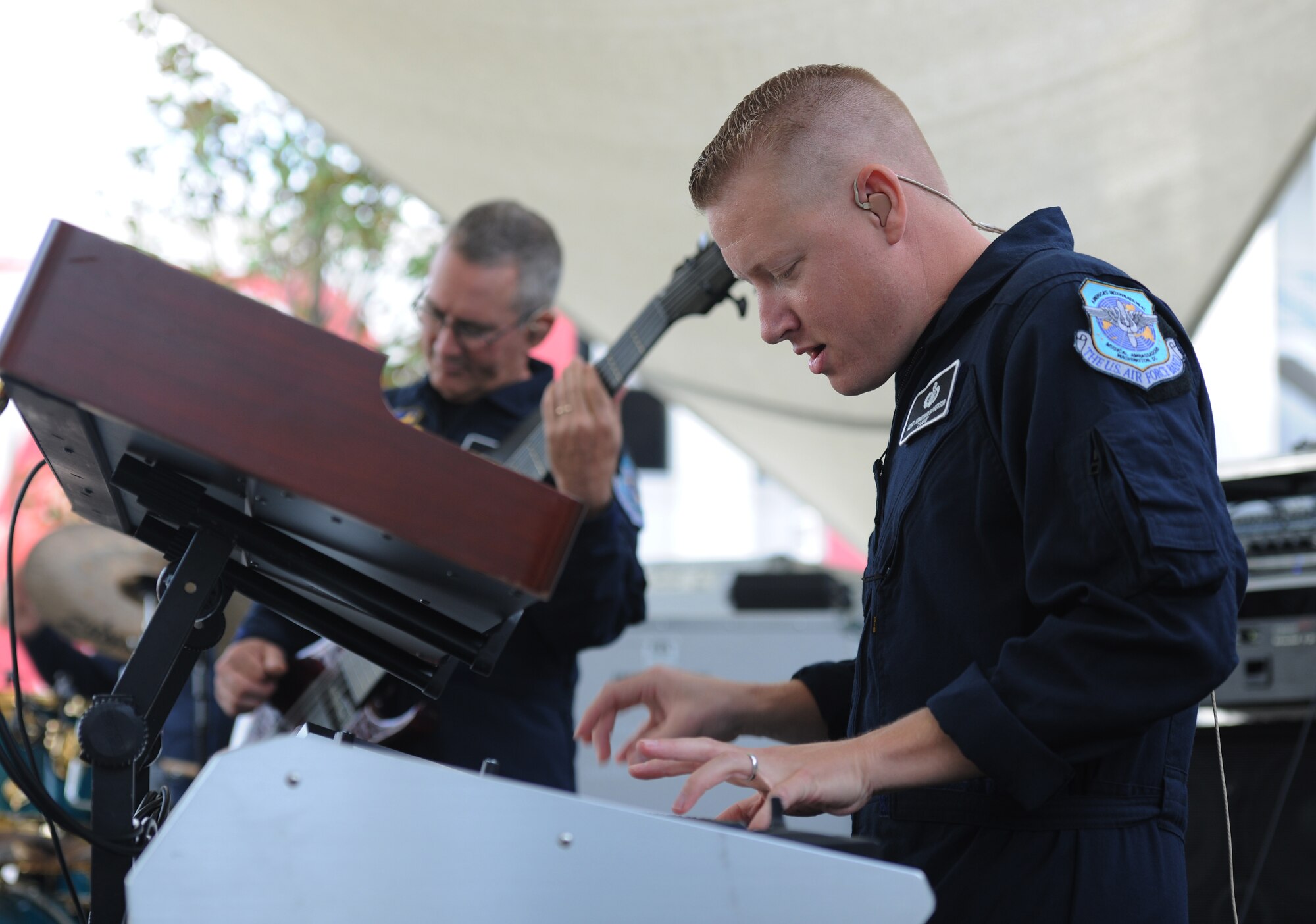 Master Sgt. Jonathan S. McPherson, Max Impact pianist, performs for fans before the Washington Nationals versus Miami Marlins baseball game at Nationals Park, Washington, D.C., Sept. 19, 2013. Airmen from the National Capitol Region participated in various pre-game events and ceremonies in honor of Air Force Night. (U.S. Air Force photo/Airman 1st Class Erin O’Shea)