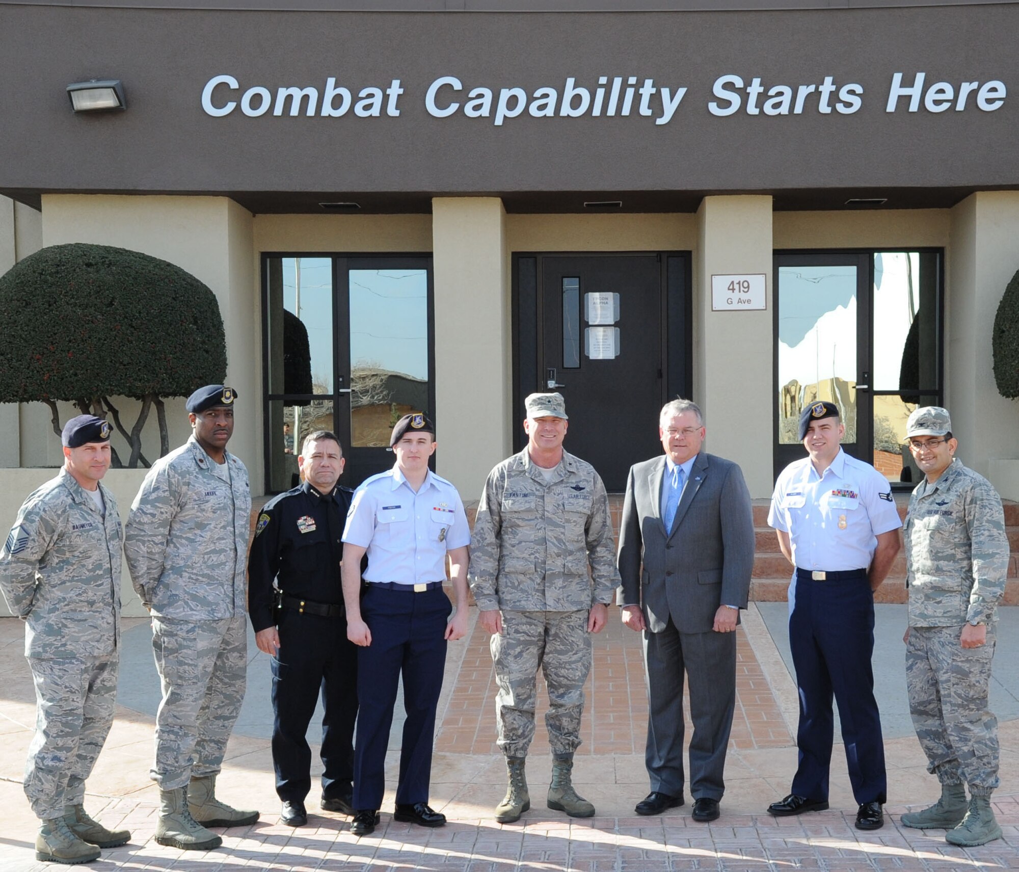Brig. Gen. Michael Fantini (center), then commander of the 82nd Training Wing, stands with then Airman 1st Class Jeremiah Foster (fourth from the left), then Airman 1st Class Johnathan Wilson (second from the right), Police Chief Manuel Borrego (third from left), and the Mayor of Wichita Falls, Glenn Barahm in front of the 82nd TRW building Jan. 25. Wilson and Foster were participating in an exchange program that allow Security Forces cops to attend the municipal police academy in Wichita Falls. (U.S. Air Force photo by Airman 1st Class Jelani Gibson) 