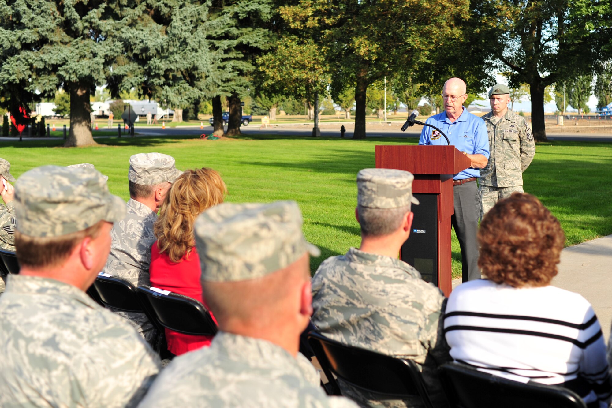 (Retired) Lt. Col. Frederick McMurray gives a speech during a POW/MIA Recognition Day Retreat ceremony at Fairchild Air Force Base, Wash., Sept. 20, 2013. McMurray, a former prisoner of war, was the guest speaker for the Retreat event. (U.S. Air Force photo by Senior Airman Taylor Curry/Released)