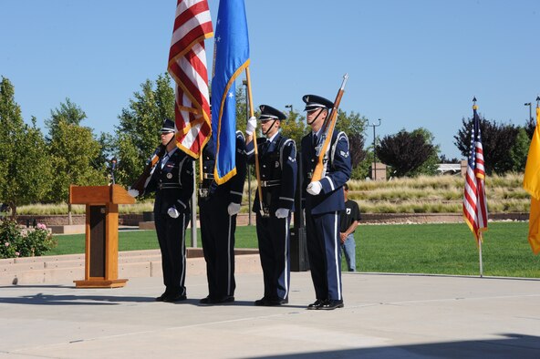 Members of the Kirtland Honor Guard present the colors at the POW/MIA Recognition Day ceremony Sept. 20 at the New Mexico Veteran's Memorial Park. Several hundred Team Kirtland members attended the event, which honored the sacrifices war veterans made in defense of our country. (Photo by Dennis Carlson)
