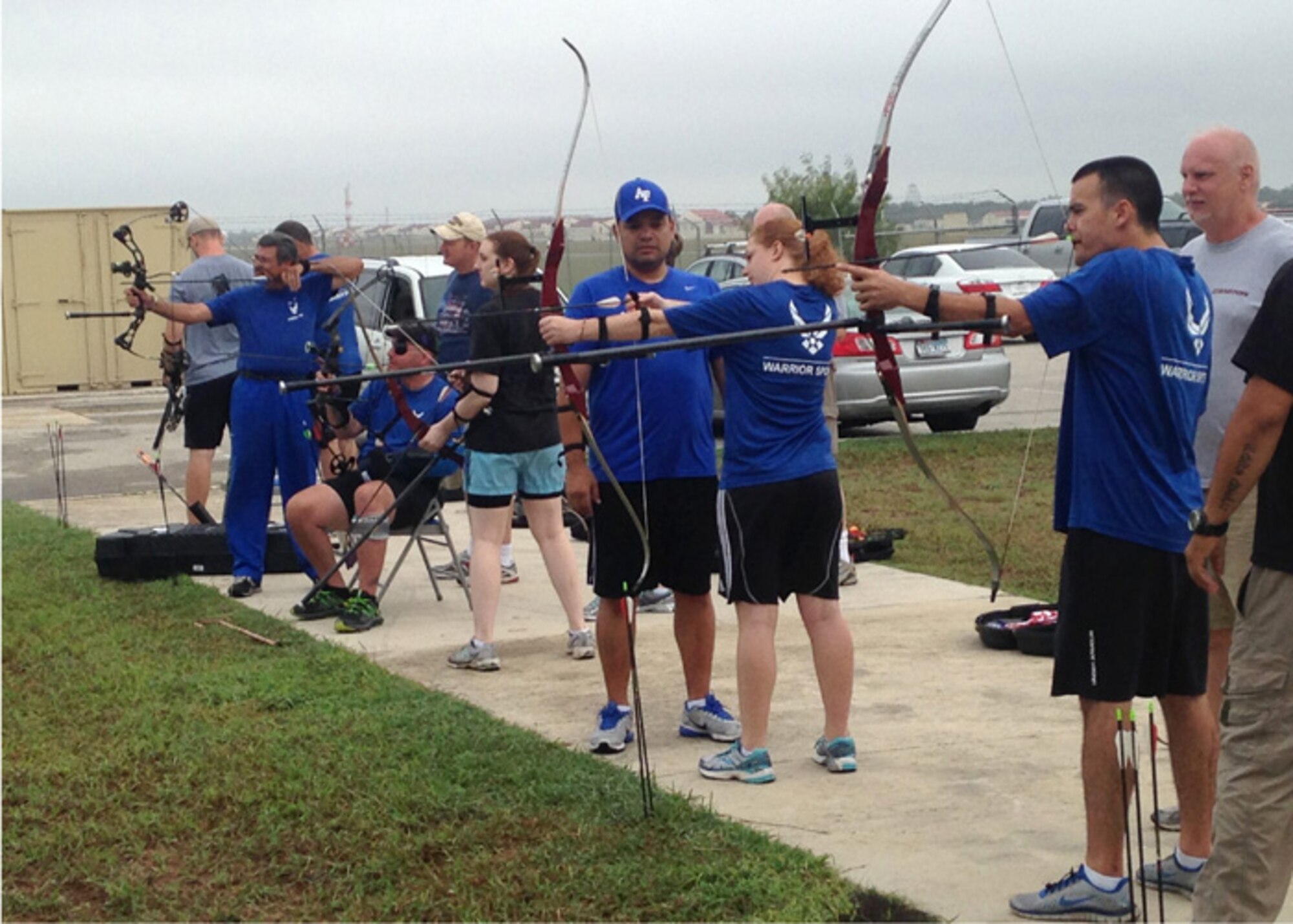 Air Force wound warriors practice archery skills during the Air Force Wounded Warrior Adaptive Sports Camp held at Joint Base San Antonio-Randolph, Sept 19. These sports camps help teach athletic skills to wounded, ill, and injured personnel to aid in healing and recovery; they also serve to recruit Airmen for the 2014 Warrior Games, an Olympics style event for all U.S. military wounded warriors. (U.S. Air Force photo/ Staff Sgt. Christopher Carwile)