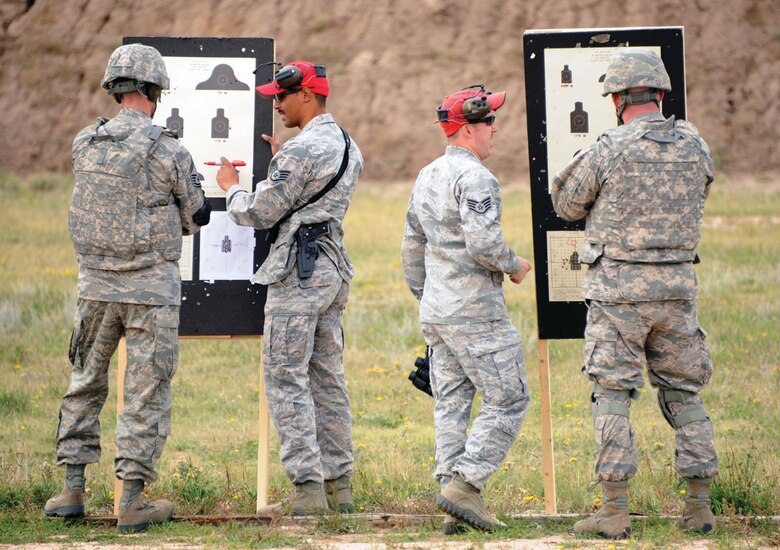 All fired up: Academy's combat arms instructors aim to ...