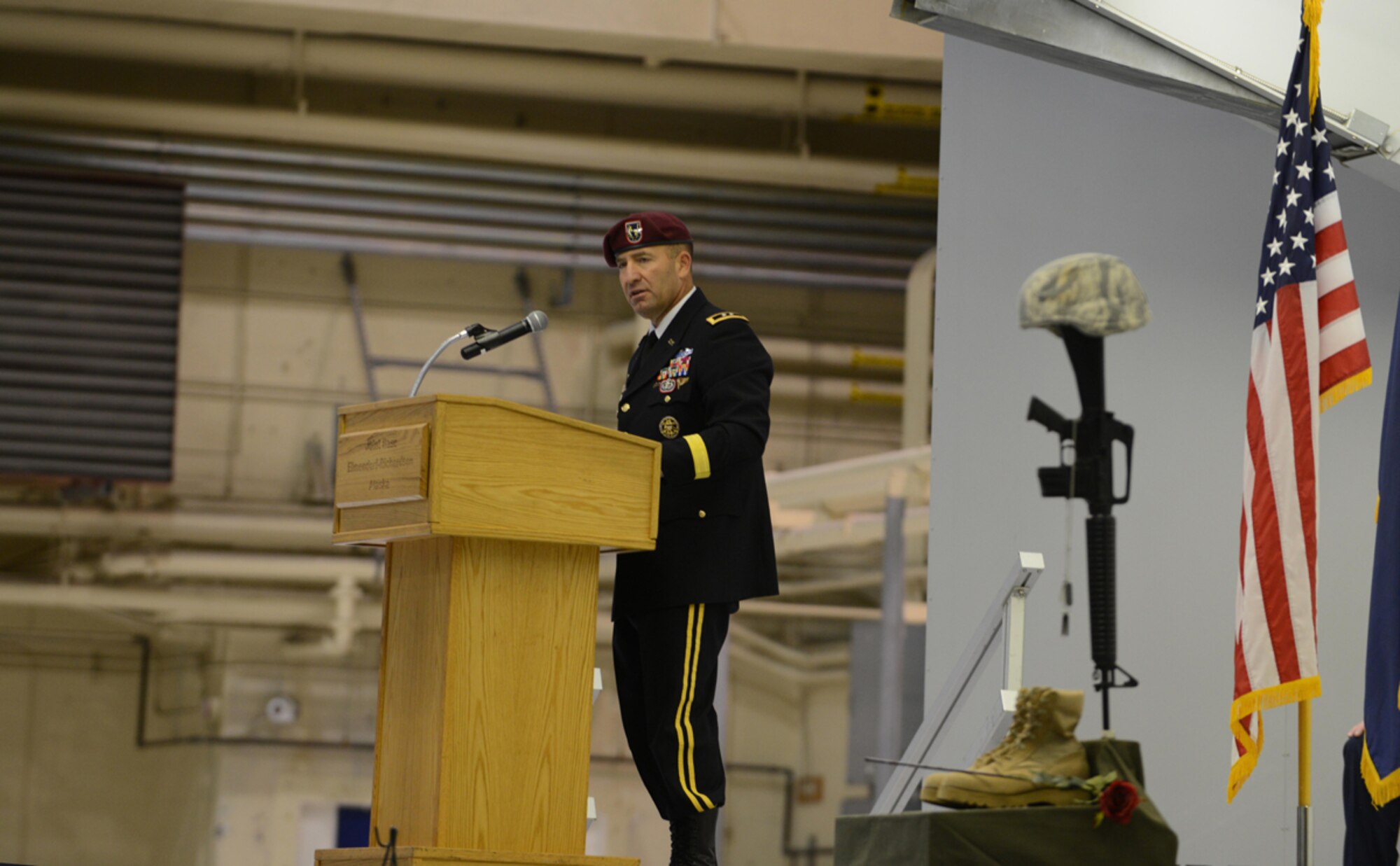 U.S. Army Gen. Michael Shields, U.S. Army Alaska commander, speaks to more than 150 Arctic Warriors during the POW/MIA recognition day ceremony at Hangar 1 on Sept. 20. The POW/MIA recognition day is observed across the nation on the third Friday of September each year to take time to remember those who were prisoners of war and those who are missing in action as well as their families. (U.S. Air Force photo/Airman Ty-Rico Lea)