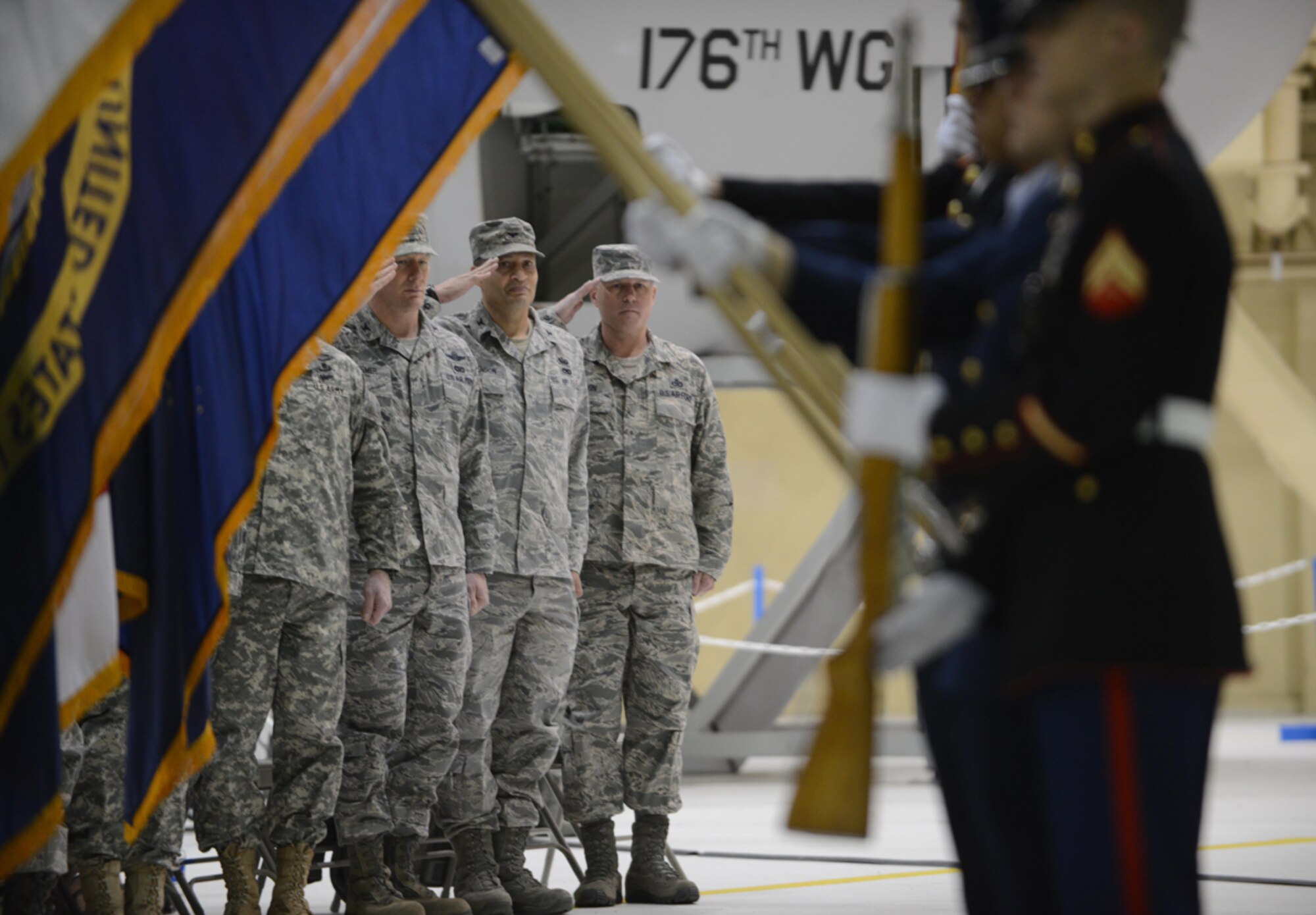 Military service members attend the POW/MIA recognition day ceremony at Hangar 1 Sept. 20. Prisoners of war and those missing in action are recognized at these to pay tribute to their selfless sacrifice to protect their country while in military service. (U.S. Air Force photo/Airman Ty-Rico Lea)