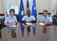 (Center) Gen. Edward A. Rice Jr., Air Education and Training Command
commander, (Left) Maj. Gen. Margaret Poore, Air Force Personnel Center
commander, and Brig. Gen. John Horner, Air Force Recruiting Service
commander, gather to sign Combined Federal Campaign forms Sept. 23 at Joint
Base San Antonio-Randolph. The CFC is one of the largest and most successful
annual charities in today's federal workplace. Airmen can check with their
local CFC representatives for details on their local campaign and how to
donate. (U.S. Air Force photo by Joel Martinez)   

