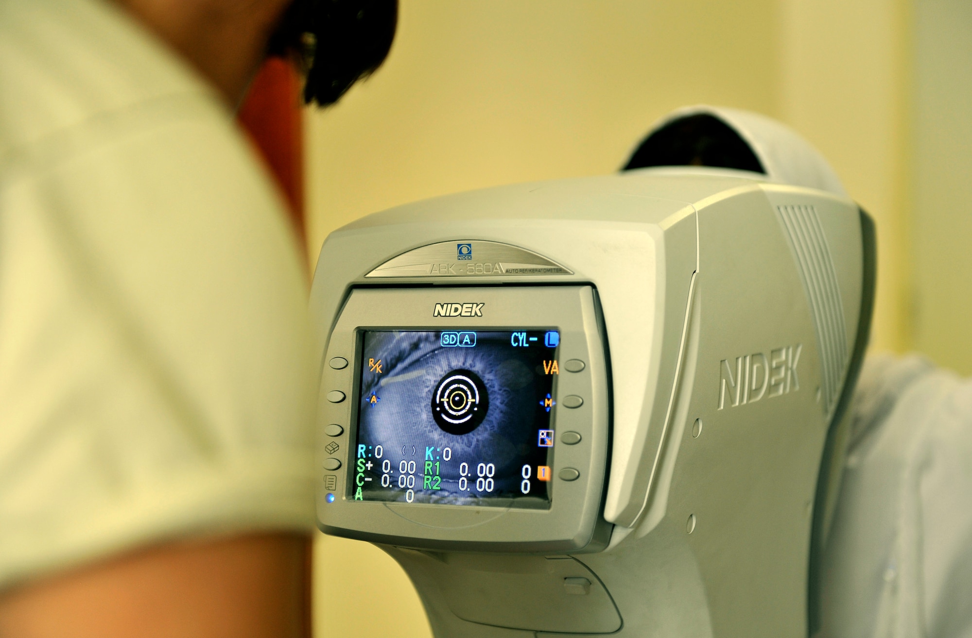 Airman 1st Class Chellbie Gonzales, 455th Expeditionary Medical Group ophthalmologist technician, conducts an eye exam on an Afghan patient before determining her prescription in the Korean Hospital on Bagram Air Field, Afghanistan, Sept. 18. Following the exam, Gonzales searched through hundreds of donated eye glasses for a matching prescription. Since arriving on Bagram five months ago, Maj. Marcus Neuffer, ophthalmologist and his assistant Gonzales, established a glasses donation center to provide glasses to Afghan and coalition members in need. The glasses come from former patients and non-profits. This is the second time they have held an eye glasses clinic here. They both are deployed from Keesler Air Force Base, Miss. (U.S. Air Force photo/ Staff Sgt. Stephenie Wade)
