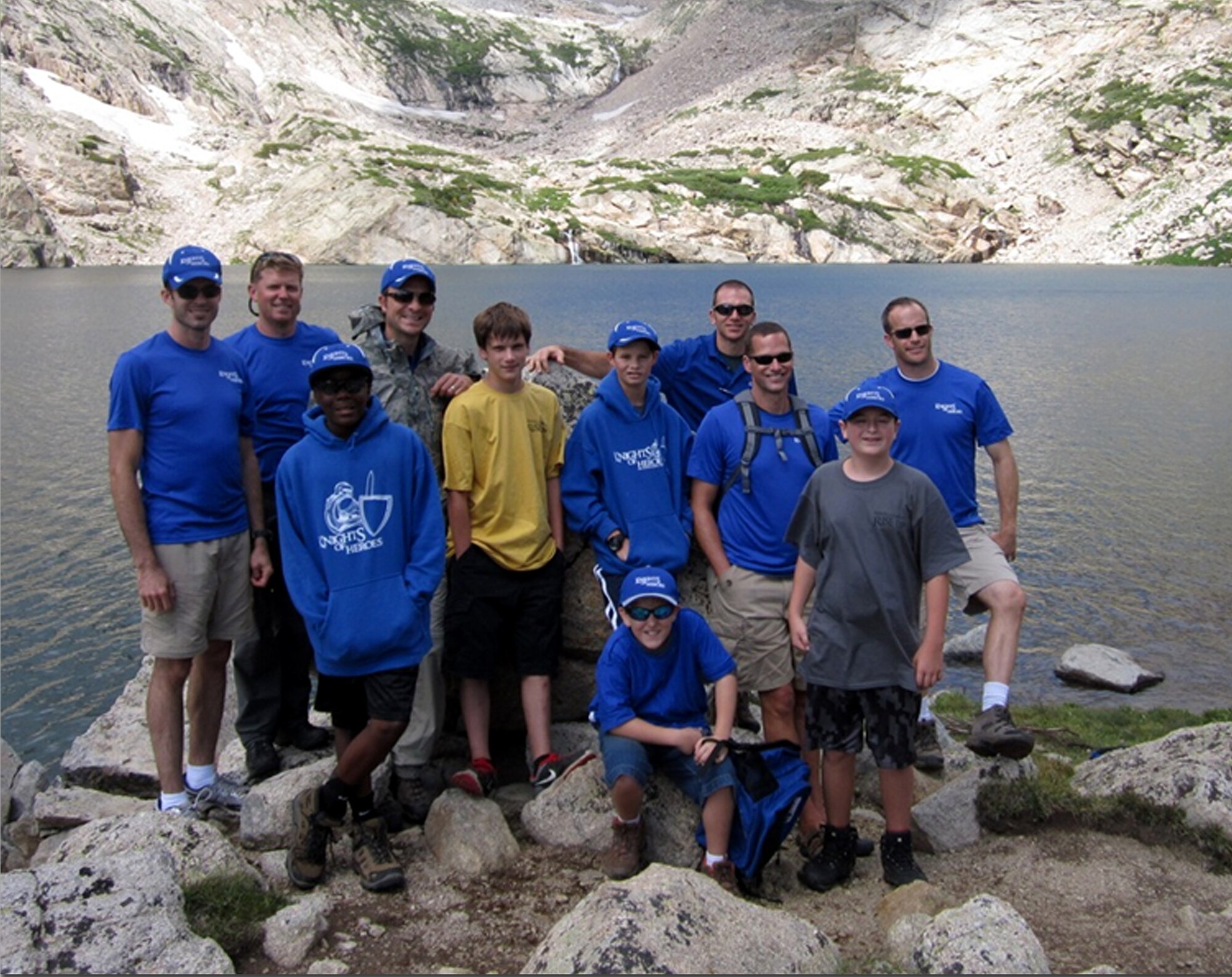 (Back row, left to right) Air Force Reservists Capt. Chris Bachelor, Maj. Charles Huber, Lt. Col. Jason Ausdemore, Maj Ryan Dekok, Lt. Col. John Oglesby and Maj Mike Barron all serve as Knights of Heroes mentors for children between the ages of 11 and 17 who have lost their fathers during military service during a week-long wilderness adventure camp.