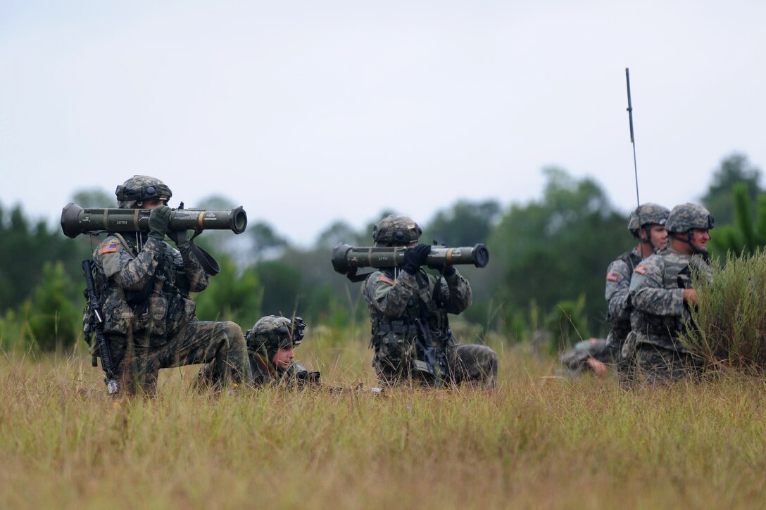 Soldiers react to enemy contact using AT4 anti-tank weapons during a combined arms live-fire exercise at the Georgia Garrison Training Center on Fort Stewart, Ga., Sept. 19, 2013.