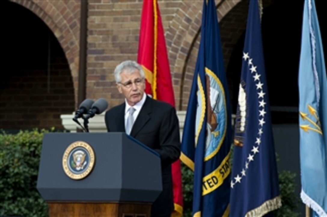 Secretary of Defense Chuck Hagel speaks during a memorial service to honor the 12 victims killed in the Sept. 16th Washington Navy Yard shootings in Washington, D.C., on Sept. 22, 2013.  Hagel joined President Barack Obama for the private memorial service at the Marine Barracks.  