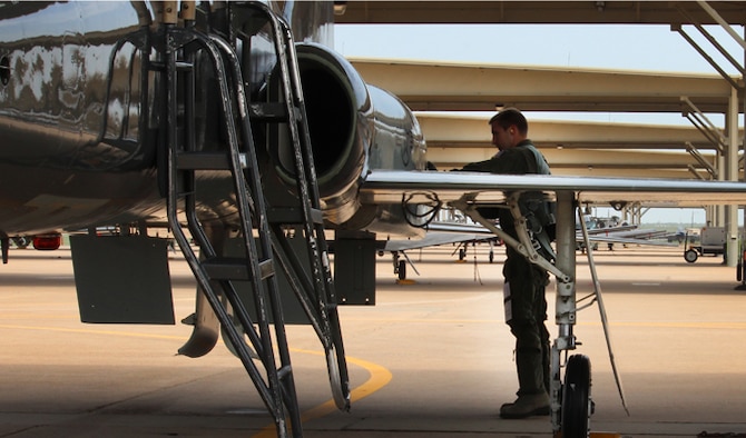First Lt Rob Hansen completes a pre-flight inspection of the T-38 Talon at Sheppard Air Force Base, Texas. After beating a bout of Hodgkin’s lymphoma cancer, he spent 16 months fighting to get back in the Euro NATO Joint Jet Pilot Training Program. Hansen is a 80th Flying Training Wing graduate pilot and was recently awarded a slot on the F-22 Raptor. (Courtesy photo)