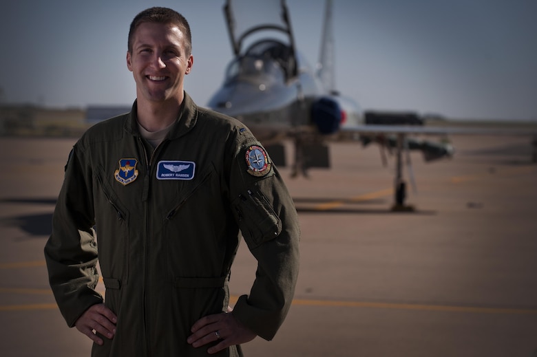 First Lt Rob Hansen beat a bout of Hodgkin’s lymphoma cancer during training, graduate and get awarded the F-22 Raptor. He spent 16 months fighting to get back in the program after his diagnosis. Upon graduating as a distinguished graduate for scoring in the top 10 percent of the class, he was awarded the Daedalian Award for top formation pilot; the Flying Excellence award for the top overall flying score, and the commander’s trophy for being the top graduate. Hansen is an 80th Flying Training Wing graduate pilot with the Euro NATO Joint Jet Pilot Training Program, Sheppard Air Force Base, Texas. (U.S Air Force photo/Staff Sgt. Mike Meares)