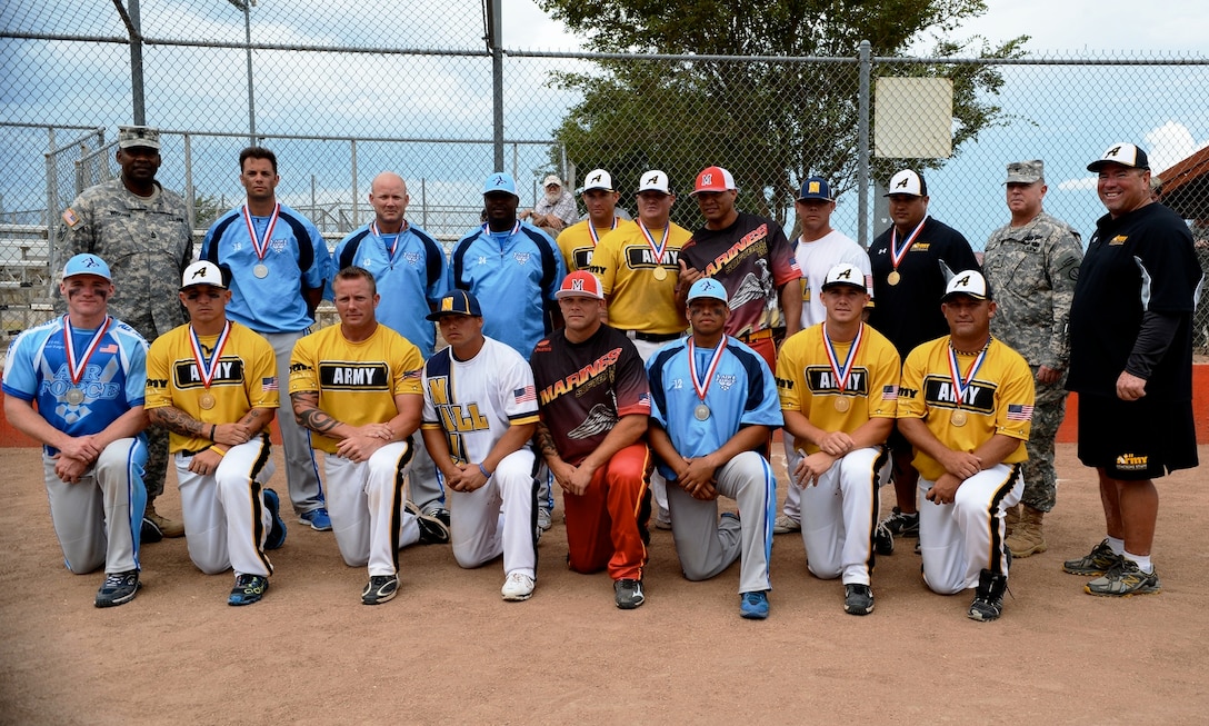 2013 Mens U.S. Armed Forces Softball Team will head to Ridgeland, MS to compete in the ASA National Softball Championship.  Team is made up of:

SrA John Allen - USAF Grand Forks AFB ND
SrA Nickolas Maragliano - USAF Youngstown ARS OH
SSG David Moore - Army Ft. Bragg, NC
CMSgt Charles Campbell - USAF Scott AFB IL
EM1 Jacob Alicuben - Navy USS Reuben
SSG Dane Miller - Army Ft. Sill, OK
SSgt Jose Otero - USAF March ARB CA
SPC Jacob Lenk - Army Bamberg, Germany
SPC Marshall Woods - Army Schofield Barracks, HI
GySgt Rynne Brandt - USMC MCB Camp Pendleton, CA
BM2 Waylon Logsdon - Navy Honolulu, HI
SGT Eric Querry - Army Ft. Hood, TX
SSG Kenneth Turlington - Army Camp Humphreys, Korea
MSgt Dexter High - USAF Nellis AFB NV
SSgt Matthew Faircloth - USMC MCB Camp Lejeune, NC

Coach, CSM (Ret.) Victor Rivera, Ft. Drum, NY (Army)
Assistant Coach, SFC Michael Dochwat, Fort Sill, OK (Army)
