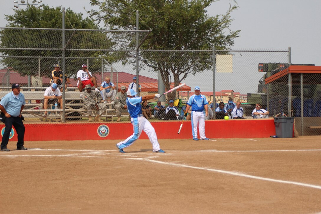 Air Force player swings for the fences at the 2013 Armed Forces Softball Championship at Fort Sill, OK 14-20 September.