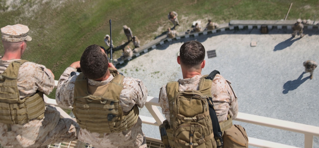 Marines of 2nd Air Naval Gunfire Liaison Company, II Marine Expeditionary Force, wait for confirmation from two F-15 Eagles with the 333rd Fighter Squadron from Air Force Base Seymour Johnson that are approaching during the close air support exercise Sept.11.