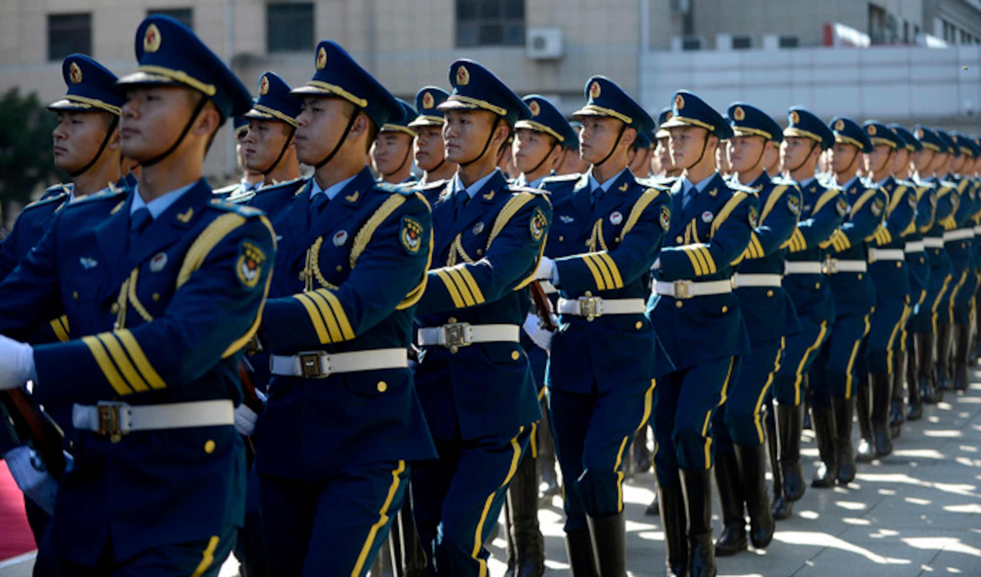 People's Liberation Army Air Force members march during a welcome ceremony in honor of Air Force Chief of Staff Gen. Mark A. Welsh III, hosted by PLAAF Commander Gen. Ma Xiaotian Sept. 25, 2013, in Beijing, China. Welsh, along with Gen. Herbert "Hawk" Carlisle and Chief Master Sgt. of the Air Force James A. Cody will visit with various military leaders as part of a weeklong trip. (U.S. Air Force photo/Scott M. Ash)