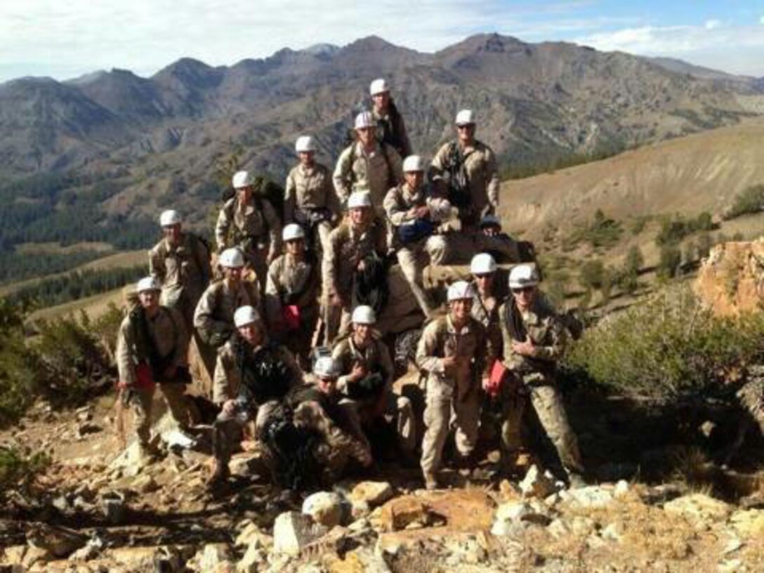 Marines with 2nd Marine Logistics Group pose for a picture at the Mountain Warfare Training Center, Bridgeport, Calif., during the assault climber’s course from Aug. 16 to Sept. 13, 2013. Service members learned how to survive and adapt in one of the most secluded posts, comprised of approximately 46,000 acres with elevations ranging from 5,000 ft. to 11,000 ft. 