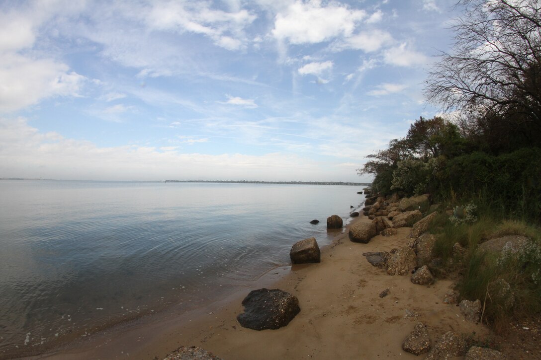 This Limited Reevaluation Report (LRR) and accompanying Environmental Assessment (EA) present the findings, conclusions, and recommendations of a limited reevaluation study of the coastal storm damage problems and needs of 7.3 miles of Chesapeake Bay shoreline within the city of Norfolk, Virginia.  A 1983 Feasibility Report, also conducted by the U.S. Army Corps of Engineers, recommended an implementable plan for a coastal storm damage reduction project which was later authorized for construction by Congress in the Water Resources Development Act of 1986.  The Authorized Project consisted of the construction and periodic sand renourishment of a protective beach berm along the entire study area shoreline.  Preconstruction Engineering and Design (PED) investigations leading to the construction of the Authorized Project were put on hold from the mid-1990s to the early 2000s due to a shift in local priorities in the study area resulting from the construction of two major Navy dredging/sand placement projects and state funding for the construction of offshore breakwaters.  In 2003, Hurricane Isabel brought about a renewed interest in the Authorized Project and with support at the local and Federal levels, PED investigations restarted to include the completion of a limited reevaluation study to determine whether there was continued Federal and local interest in the construction of the Authorized Project or a reformulated project plan.
In compliance with the National Environmental Policy Act (NEPA), the LRR and accompanying EA must be made available to the public in the affected area for thirty (30) days to allow for review and comment. 