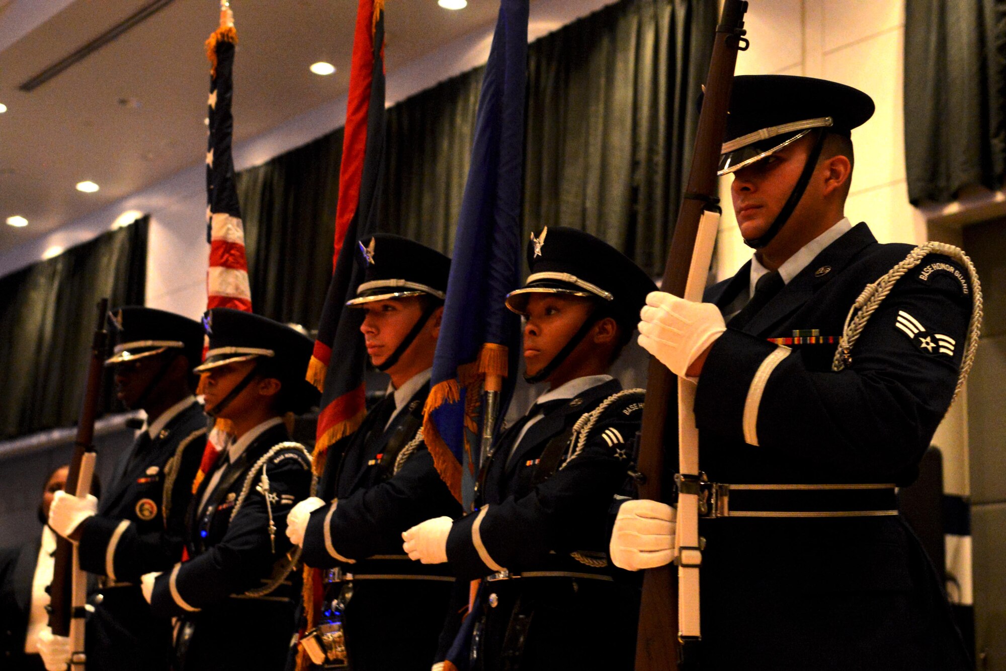 The Andersen Air Force Base Honor Guard presents the colors at the beginning of the 66th Annual Air Force Ball Sept. 20, 2013, at Leo Palace in Yona, Guam. The Air Force Ball celebrates the creation of the U.S. Air Force as an independent service in 1947, when the Air Force separated from the U.S. Army. (U.S. Air Force Photo by Airman 1st Class Emily A. Bradley/Released)