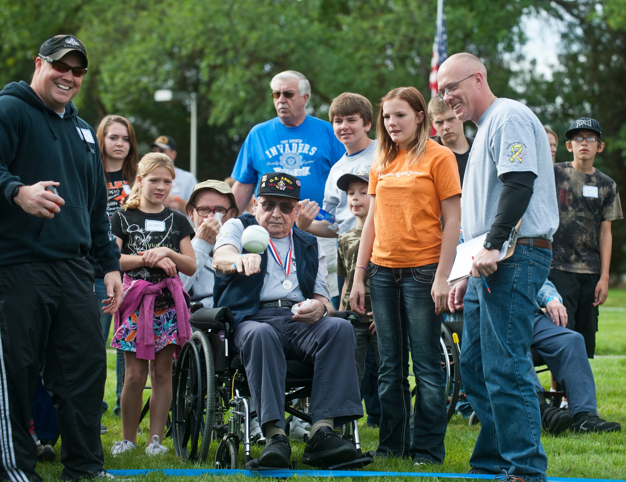Pete Cantos throws a softball Sept. 21, 2013, at the Veterans Olympics in Boise, Idaho. Cantos, along with other veterans, had volunteers escorted him and cheered him on while he participated in the events. (U.S. Air Force Photo by Airman 1st Class Brittany A. Chase/Released) 