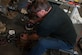 Robert Kramer, Army Strategic Logistics Activity Charleston mechanic level III, works on an Army tactical vehicle Sept. 24, 2013, at Joint Base Charleston - Weapons Station, S.C.  ASLAC provides the U.S. warfighter the ability to quickly generate combat power at any location designated by the National Command Authority by establishing, maintaining and reconstituting Army Prepositioned Stocks Afloat. (U.S. Air Force photo/Senior Airman Ashlee Galloway)