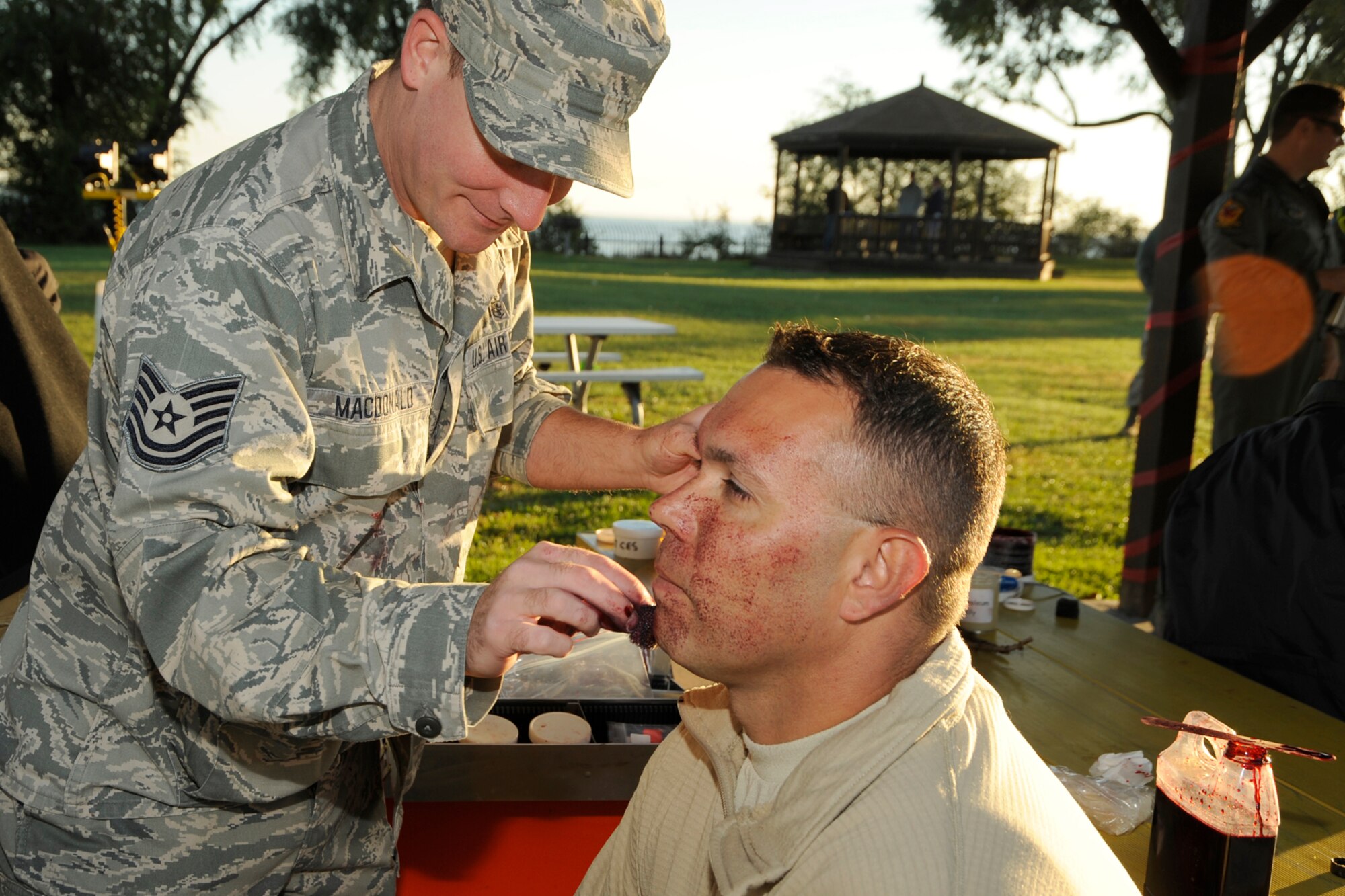 130924-Z-YW189-016 Several members of the 127th Selfridge Air National Guard Base respond to “injured “victims during a simulated bomb explosion during a Major Accident Response Exercise. The exercise was held to test and evaluate the preparedness of multiple first responder agencies at the Selfridge Air National Guard Base, Mich., September 24, 2013. (U.S. Air National Guard photo by Staff Sgt. Samara Taylor/Released)