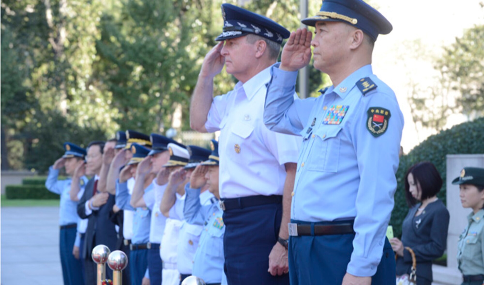 Air Force Chief of Staff Gen. Mark A. Welsh III salutes during an arrival ceremony in his honor, hosted by People's Liberation Army Air Force Commander Gen. Ma Xiaotian in Beijing, China, Sept. 25, 2013.  Welsh, along with Gen. Herbert "Hawk" Carlisle and Chief Master Sgt. of the Air Force James A. Cody will visit with various military leaders as part of a weeklong trip.  (U.S. Air Force photo/Scott M. Ash)