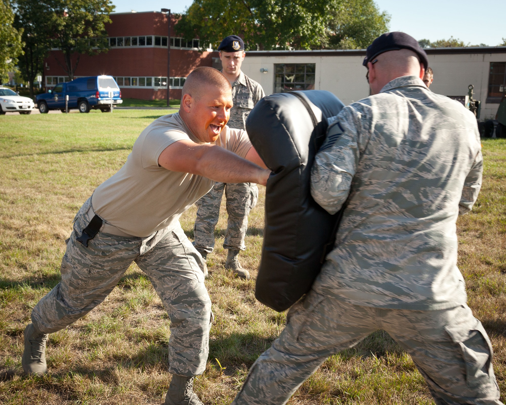 Staff Sgt. Kyle Umentum, 934th Security Forces Squadron, trains against Master Sgt. Ronald Blackledge, 934 SFS, after being exposed to pepper spray during an exercise at the Minneapolis-St. Paul Air Reserve Station, Minn.  (U.S. Air Force photo/Shannon McKay)