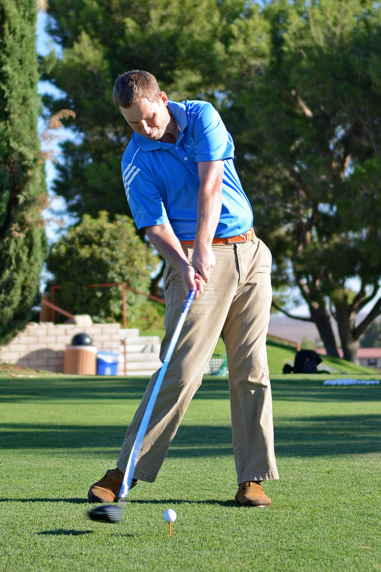 Staff Sgt. John-Paul Hansen, a C-130J and C-17 test loadmaster with the 418th Flight Test Squadron, tees off for the first time at Muroc Lake Golf Course at Edwards on Sep. 23. Before arriving to Edwards, Hansen recently competed at the Armed Forces Golf Championships at Parris Island, S.C., Sept. 15 through 18, where he placed 14 out of 24 servicemembers from the Air Force, Navy, Marine Corps and Army. (U.S. Air Force photo by Jet Fabara) 