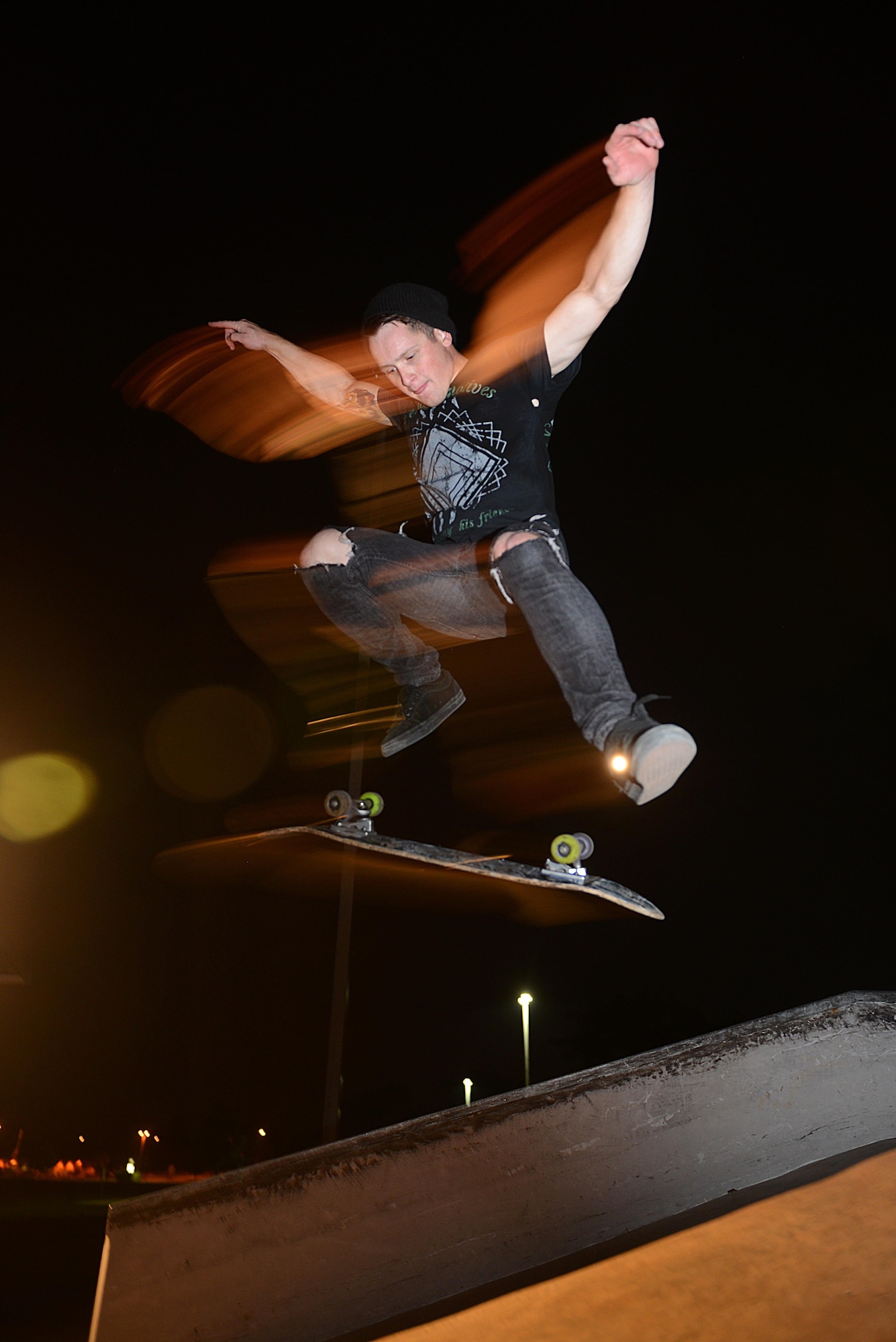 Airman 1st Class Dana Ragsdale kickflips a slope Sept. 19, 2013 at the skatepark in O’Fallon, Ill. At the age of 19, he chose to join the Air Force, and was eventually stationed here in June of this year. Ragsdale is a meteorologist for the 15th Operational Weather Squadron. (U.S. Air Force photo/Senior Airman Jake Eckhardt)