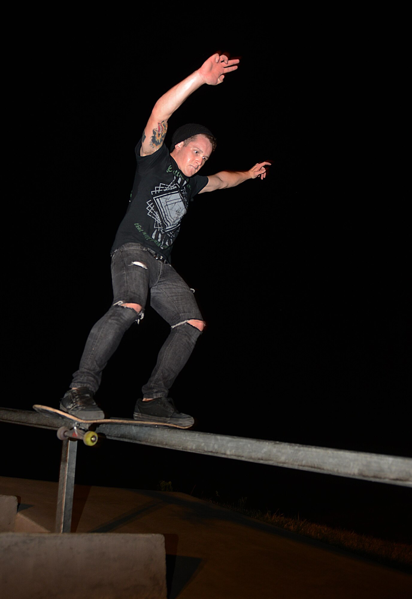 Airman 1st Class Dana Ragsdale backside boardslides a rail Sept. 19, 2013 at the skatepark in O’Fallon, Ill. The airman started skateboarding at the age of eight. Ragsdale is a meteorologist for the 15th Operational Weather Squadron. (U.S. Air Force photo/Senior Airman Jake Eckhardt)