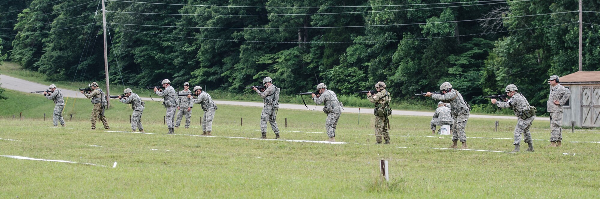 Kentucky Air and Army National Guard members fire M16 and M4 rifles during the Adjutant General’s Kentucky National Guard State Rifle and Pistol Training Event on July 27, 2013, at Fort Knox, Ky. Fifteen Airmen from the 123rd Airlift Wing competed in the contest July 27 and 28. The 123rd took first place in the pistol team competition, rifle team competition and overall aggregate. (U.S. Air National Guard photo by Master Sgt. Phil Speck)