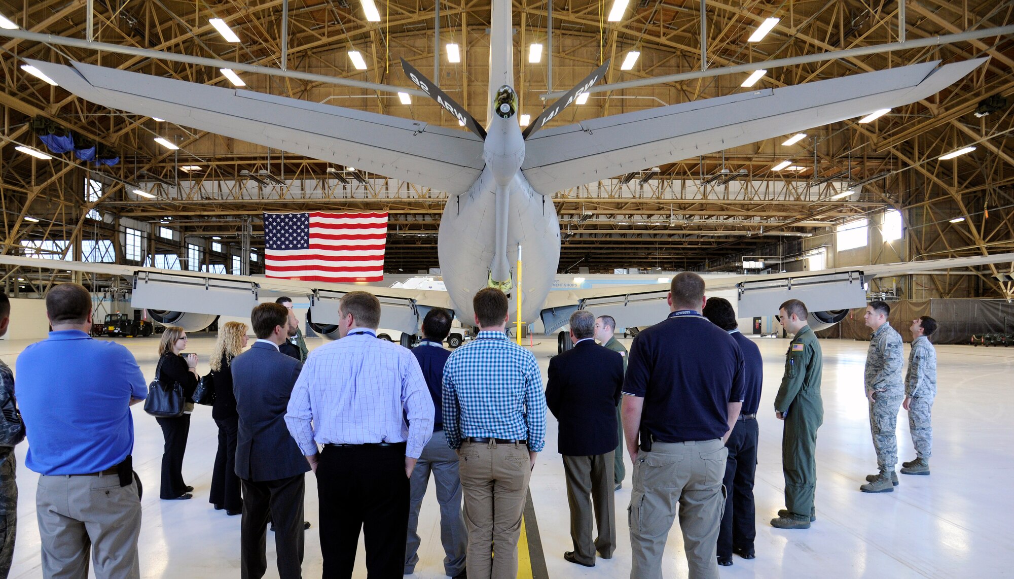 Members of the Spokane Airport Operation Staff tour a static KC-135 Stratotanker inside the maintenance hangar at Fairchild Air Force Base, Wash., Sept. 20, 2013. Working at Spokane Airports the staff can relate to what Team Fairchild does on a daily basis. They toured the airfield and control tower and were shown a KC-135 Stratotanker. (U.S. Air Force photo by Airman 1st Class Ryan Zeski/Released)