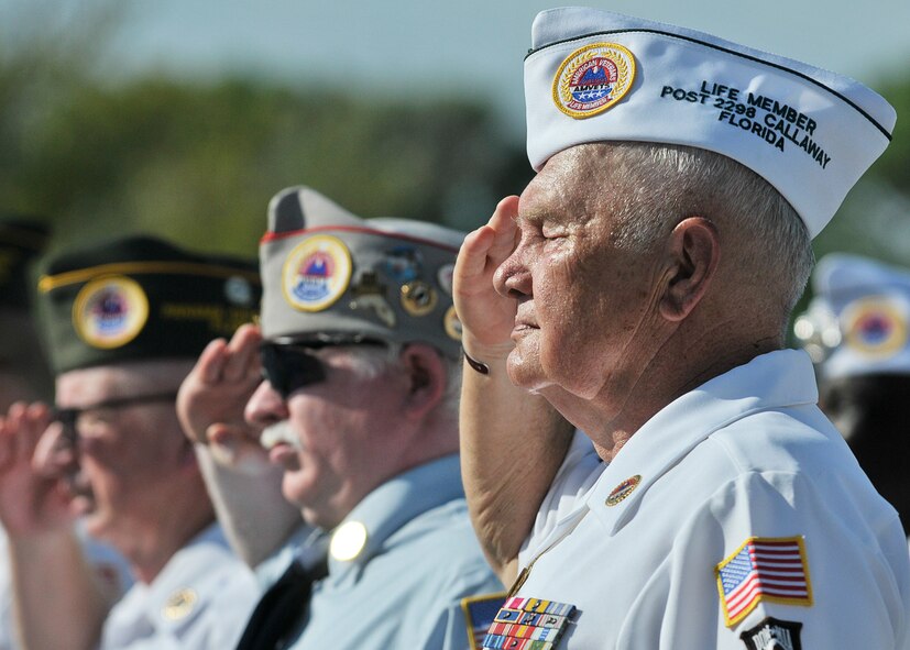 Members of the AmVets organization, along with Airmen from Tyndall Air Force Base, participate in the POW/MIA retreat ceremony held at Tyndall Air Force Base Sept. 20. (U.S. Air Force Photo by Staff Sgt. Javier Cruz)