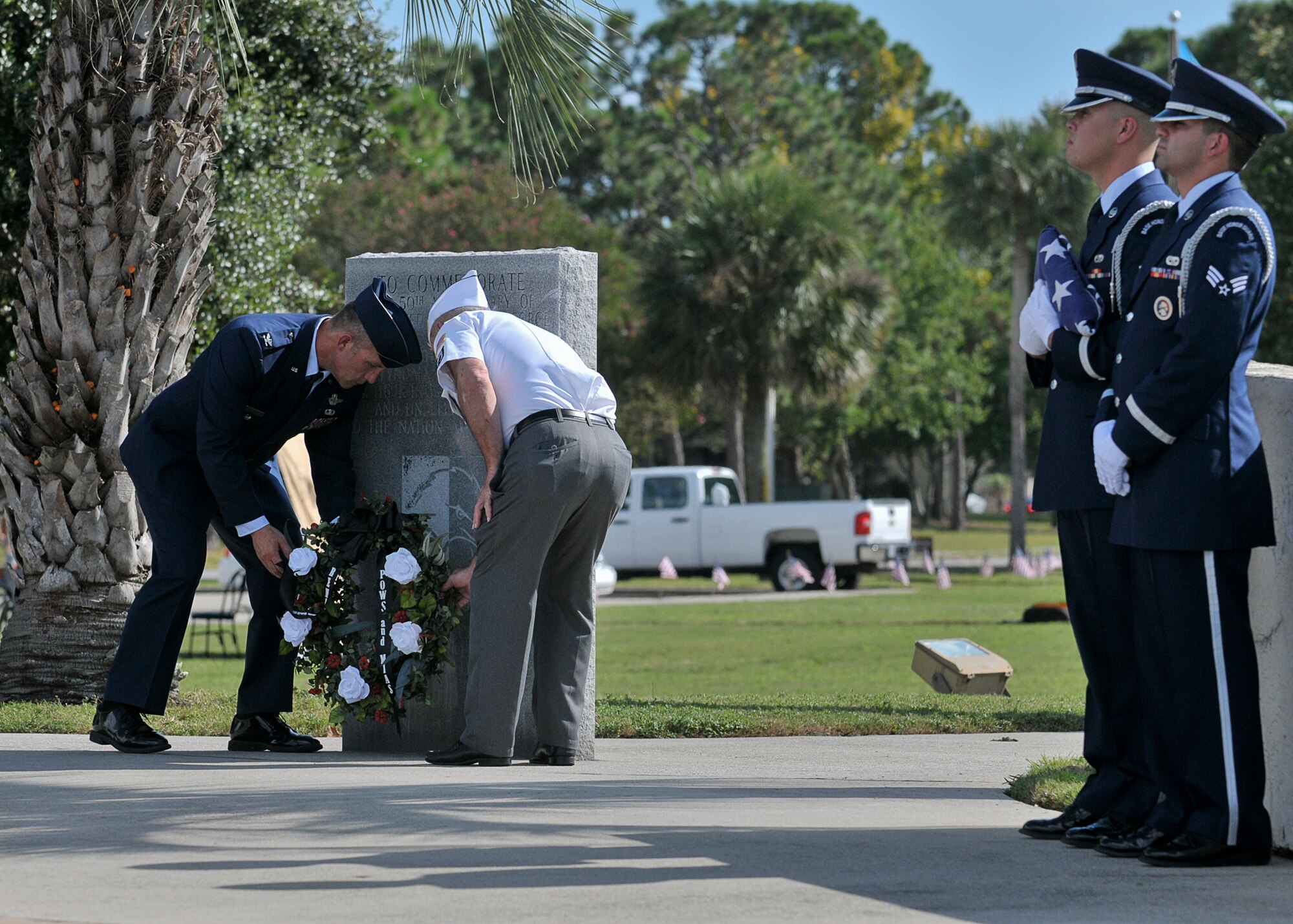 Col. Mark O’Laughlin, 325th Fighter Wing, Vice Commander (left) and Mr. Allen Bagett, AmVets Department of Florida, Commander (left), lay a wreath during the POW MIA retreat ceremony at Tyndall Air Force Base Sept. 20. (U.S. Air Force photo by Staff Sgt. Javier Cruz)