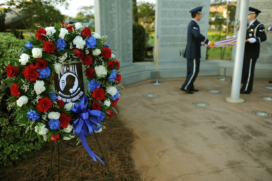 A wreath containing the symbol of Prisoner of War/Missing in Action is displayed at the site of the POW/MIA Recognition Day ceremony at the air park on Hurlburt Field, Fla., Sept. 20, 2013.The POW/MIA symbol serves as a reminder of the 1,645 service member still missing today. (U.S. Air Force photo/Senior Airman Kentavist P. Brackin)