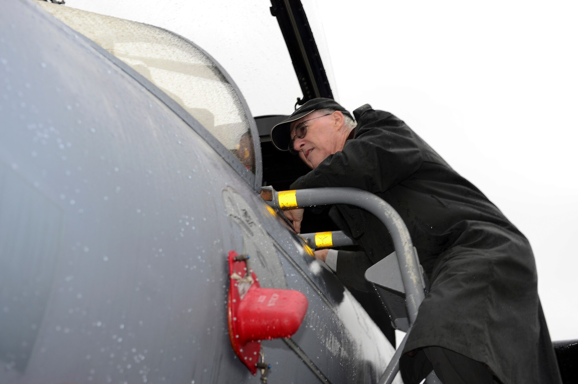 Barry White, U.S. Ambassador to Norway, views the cockpit of an F-15C Eagle during his visit to Bodø Main Air Station, Norway, Sept. 20, 2013. White met with leaders and personnel from the United States, Norway, Finland and Sweden on station in support of Arctic Challenge Exercise 2013. ACE-13 is a combined exercise, with NATO allies and regional partners that provides an opportunity for all forces to integrate operations and build upon our international relationships. Approximately 30 aircraft and 600 personnel deployed from RAFs Lakenheath and Mildenhall in support of ACE-13. (U.S. Air Force photo by Master Sgt. Lee Osberry/Released)
