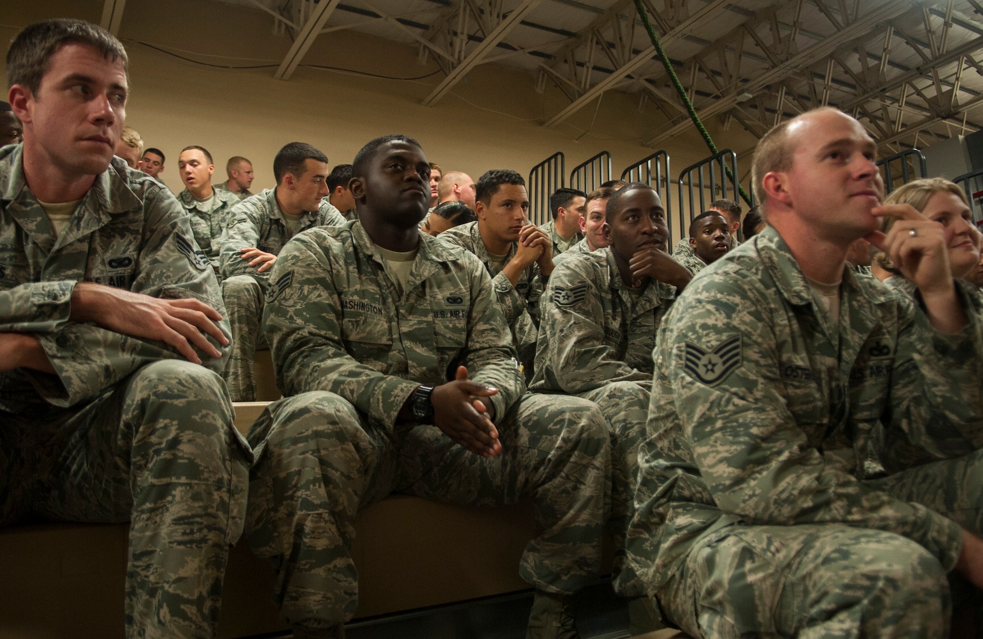 Members of the 824th Base Defense Squadron look on during a Bronze Star Medal presentation ceremony for U.S. Air Force Capt. Brian Bray, 824th BDS intelligence officer, at Moody Air Force Base, Ga., Sept. 20, 2013. The Bronze star is the 10th highest military award. (U.S. Air Force photo by Airman 1st Class Sandra Marrero/Released)
