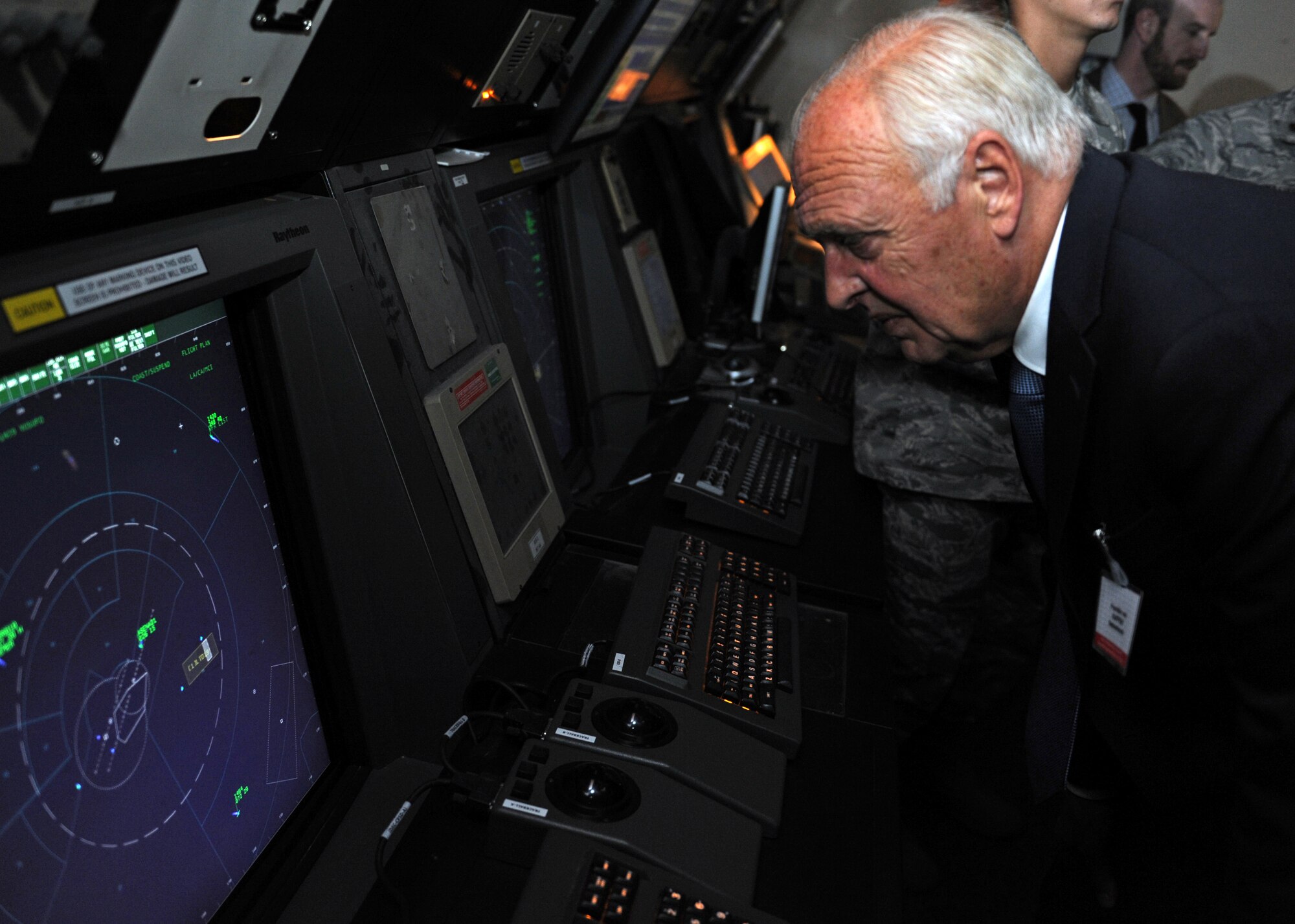 Franklin van Kappen, Netherlands Delegate for the NATO Parliamentary Assembly studies a radar approach control terminal Sept. 24, 2013 at Incirlik Air Base, Turkey. The 20 participants in the tour received an up-close look at Incirlik AB operations. (U.S. Air Force photo by Senior Airman Chase Hedrick/Released)