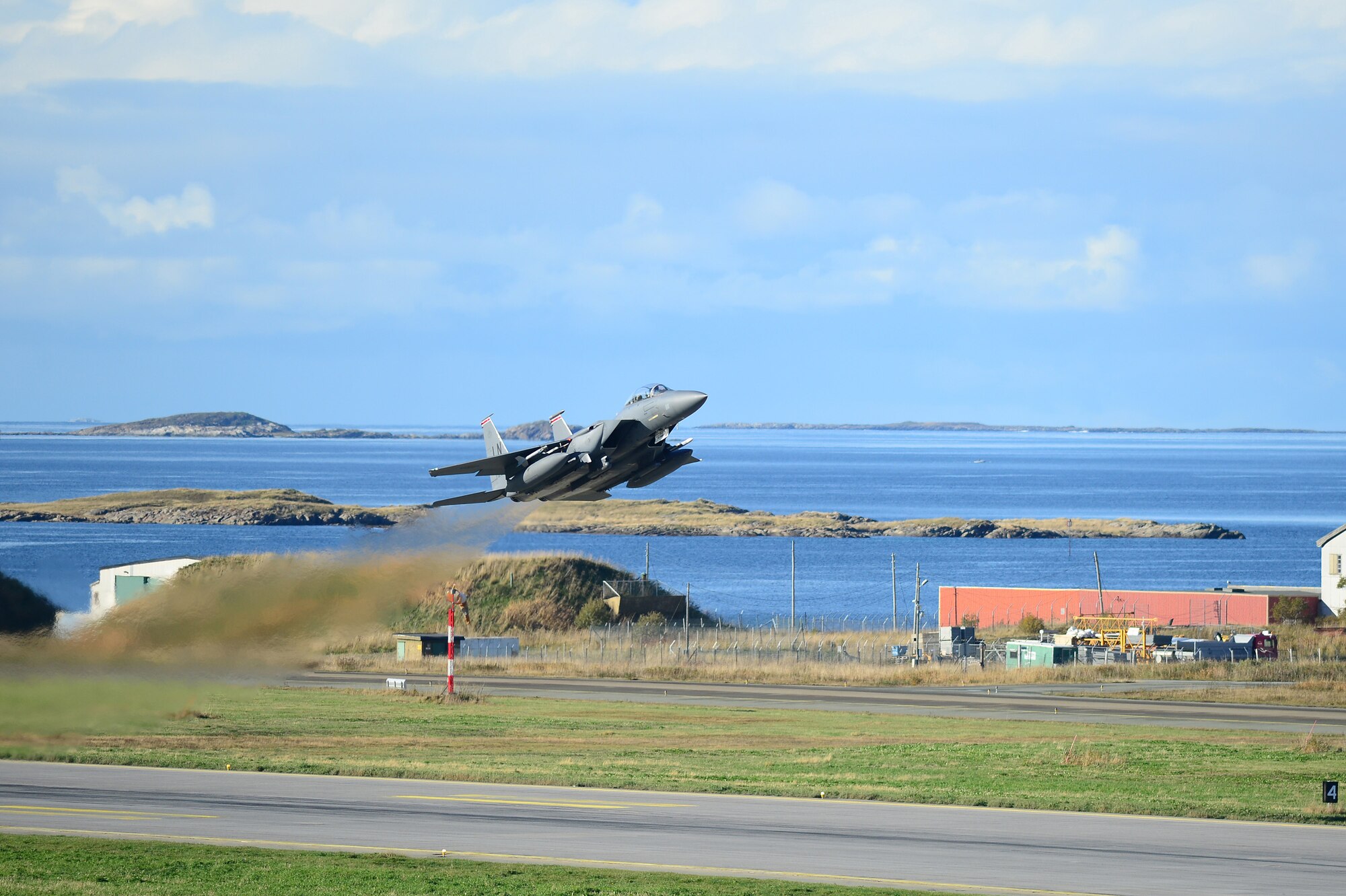 An F-15E Strike Eagle, assigned to the 494th Fighter Squadron, takes off from Bodø Main Air Station, Norway Sept. 23, 2013. Approximately 30 aircraft deployed from RAFs Lakenheath and Mildenhall, to multiple locations in Norway, in support of the Arctic Challenge exercise 2013 (ACE-13). ACE-13 is a combined exercise with NATO allies and regional partners, which promotes continued interoperability between the United States, Norway, Sweden and Finland. (U.S. Air Force photo by Master Sgt. Lee Osberry/Released)