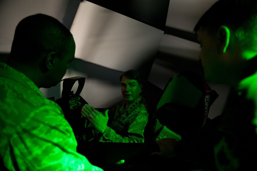 Lt. Gen. Jan-Marc Jouas, Republic of Korea and United States Combined Command, Air Component Command commander , tours the F-16 Mission Training Center at Kunsan Air Base, Republic of Korea, Sept. 24, 2013. The training center provides realistic, cost-effective training scenarios in a fiscally constrained environment. (U.S. Air Force photo by Senior Airman Clayton Lenhardt/Released)