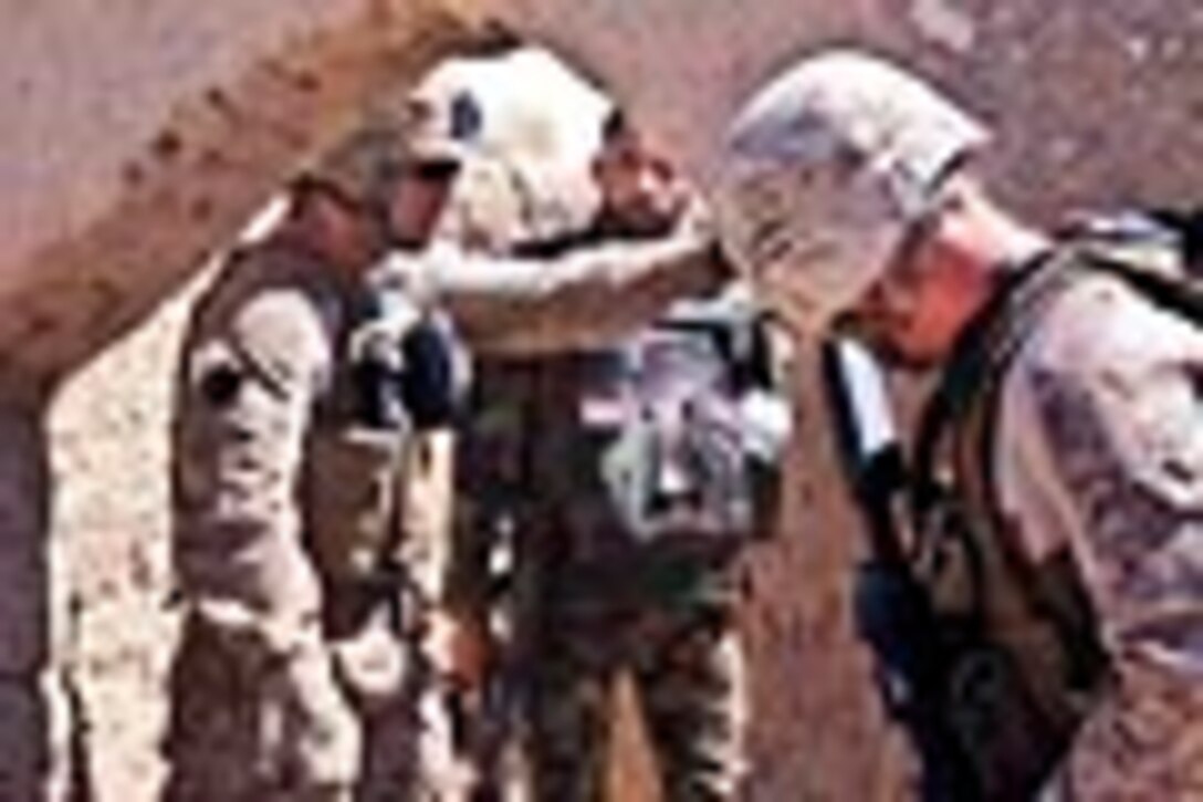 Coalition Forces, Afghan Soldiers Patrol in Barrmo, Afghanistan