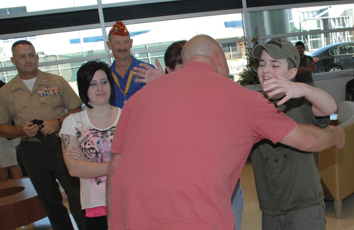 James Burris, heavy mobile equipment mechanic leader, Forward Branch, Marine Depot Maintenance Command, arrive at the Southwest Georgia Regional Airport Sept. 20,s marking the last two MDMC civilian-Marines to support Overseas Contingency Operations.