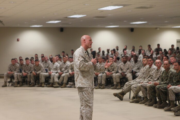 Gen. James F. Amos, commandant of the Marine Corps, and Sgt. Maj. Michael P. Barrett, sergeant major of the Marine Corps, speak to noncommissioned officers from Marine Corps Air Station New River and Camp Geiger at Ivy Hall Sept. 17.