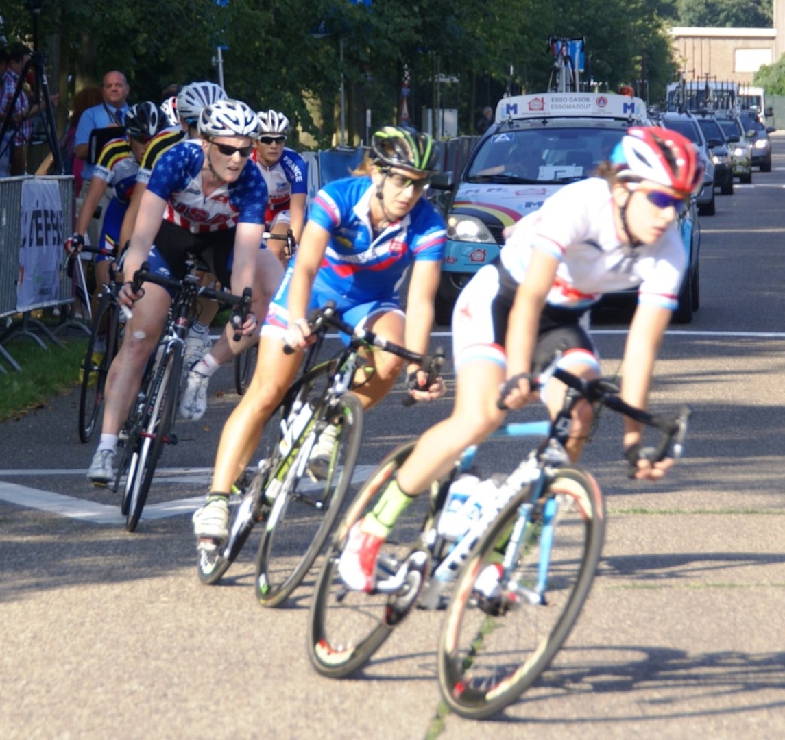 LCDR Katy Giles (Navy) - left - competes in the womens road race at the 2013 CISM World Military Cycling Championship 2-6 September in Leopoldsburg, Belgium.  