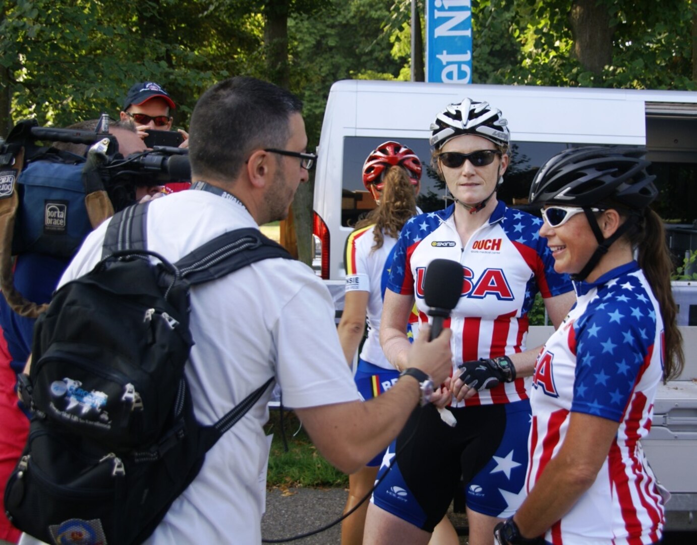 LCDR Katy Giles (Navy) (left) and SGT Maatje Benassi (Army) interview after their bronze medal performance.