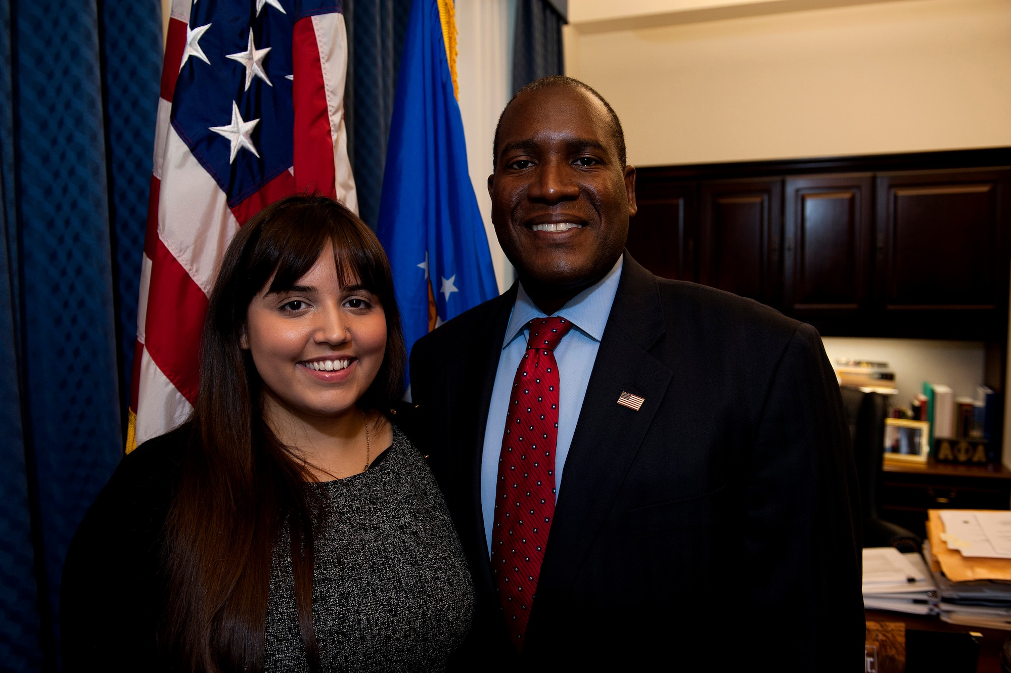 Air Force intern Natalie Labayen poses with her supervisor, Dr. Jarris Taylor, who's the Deputy Assistant Secretary of teh Air Force for the Strategic Diversity Integration office, Sept. 13, 2013 in the Pentagon.  Labayen recently won a Department of Defense award for her significant contributions in the Air Force Strategic Diversity Integration Office. Labayen, who has an autoimmune disease, won the Judith C. Gilliom Award, presented by the Workforce Recruitment Program Award Ceremony Aug 2. 