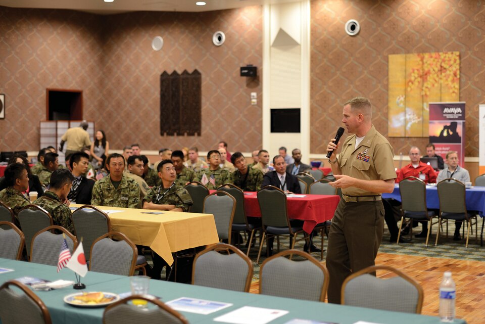 Col. Scott F. Stebbins delivers the keynote address at the Armed Forces Communications and Electronics Association Okinawa conference Sept. 20 at the Crow’s Nest on Camp Shields. Stebbins is the commanding officer of Marine Air Control Group 18, 1st Marine Aircraft Wing, III Marine Expeditionary Force.