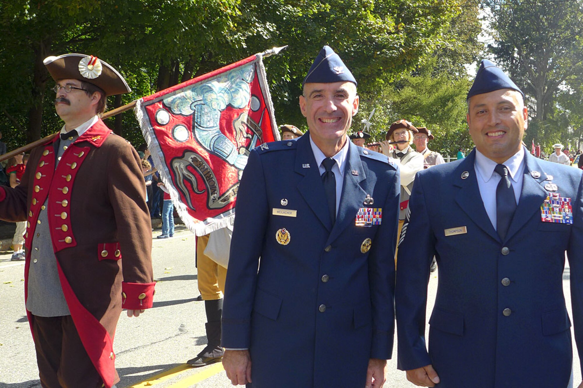 BEDFORD, Mass. – Col. Lester A. Weilacher, 66th Air Base group commander, and Chief Master Sgt. Joseph Thompson, C3I and Networks operations superintendent, march in the Bedford Day parade with other Bedford community leaders Sept. 21. The parade celebrated the 284th anniversary of the town’s incorporation. (Courtesy photo)  